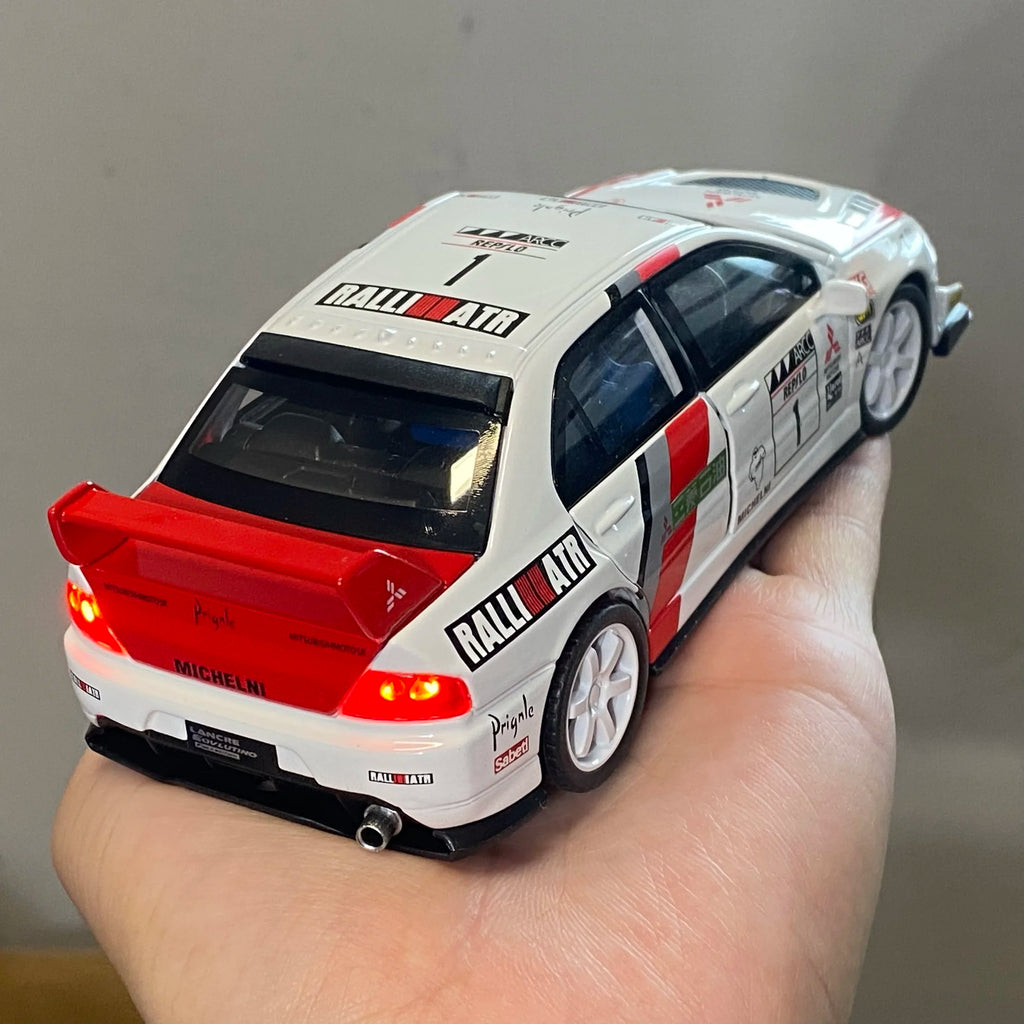MITSUBISHI LANCER EVOLUTION EVO RALLYE - Coche de aleación 1:32